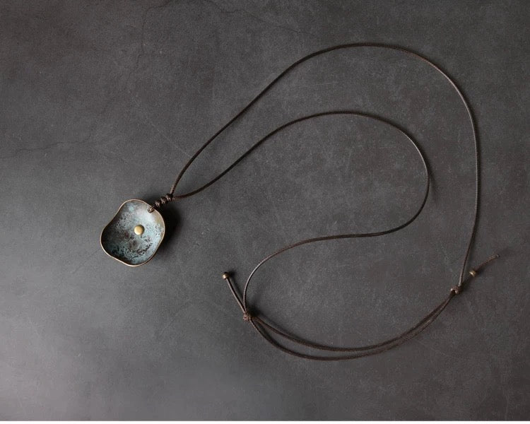 Reading the Carvings: Symbols & Meanings on Your Taoist Pendant