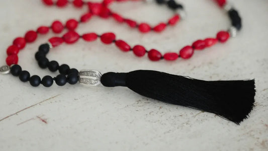 What is the history and meaning of prayer beads